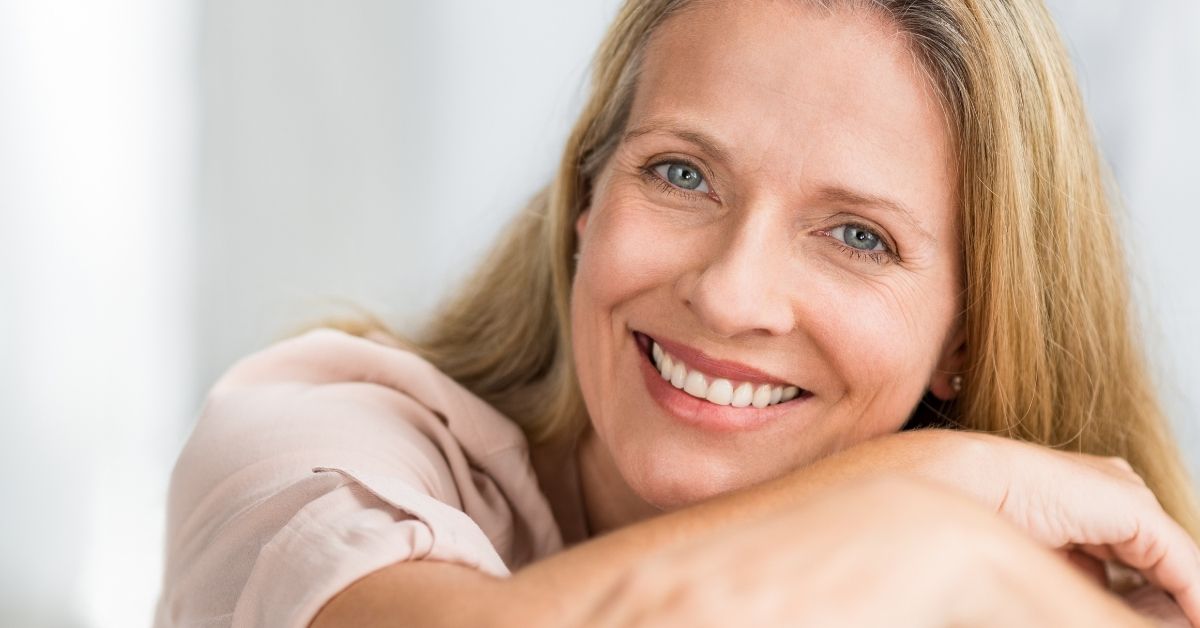 10 Things a Mature Woman Does NOT Do In a Relationship - Mature Singles Finding Love Confident mature woman smiling with a relaxed and peaceful expression – representing self-awareness and emotional strength in relationships