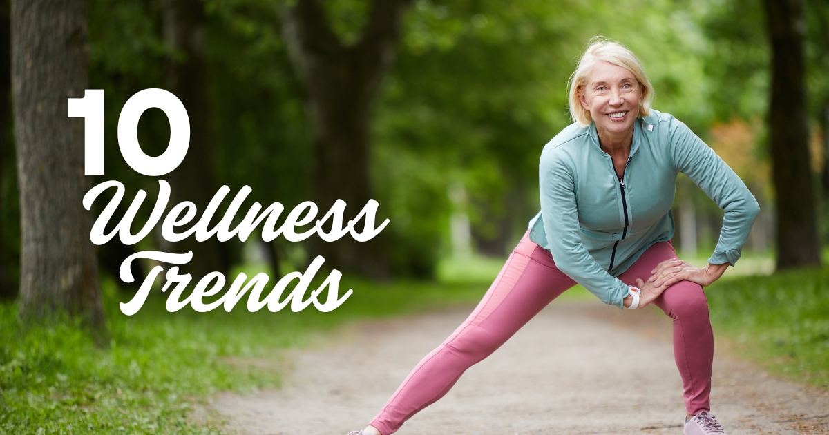 10 Wellness Trends for Singles Over 50 - Mature Singles Finding Love Active senior woman stretching outdoors in athletic wear with text “10 Wellness Trends,” promoting healthy living and fitness for singles over 50.