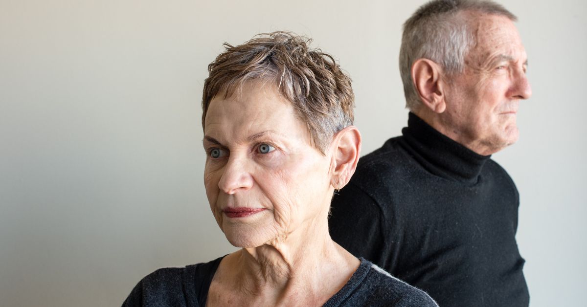Always Fighting_ Should You Break Up - Mature Singles Finding Love Older couple standing back-to-back looking upset and distant, symbolizing relationship conflict or constant fighting in a mature relationship.