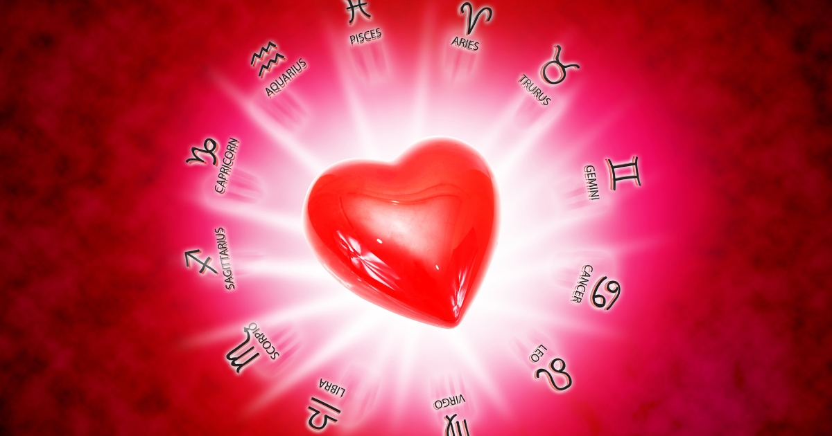 Astrology For Dating_ Who Are You Most Compatible With - Mature Singles Finding Love Red heart surrounded by zodiac signs glowing against a cosmic background, symbolizing astrology-based love and relationship compatibility.