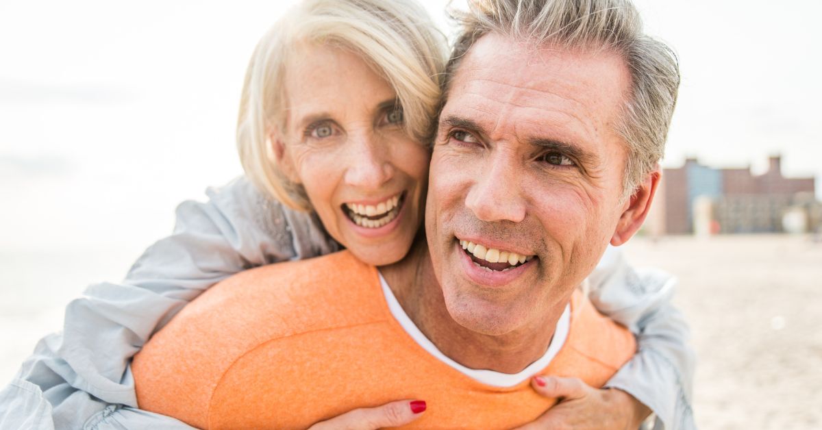 Autism And Dating_ 5 Things To Consider - Mature Singles Finding Love Happy senior couple enjoying time together at the beach.