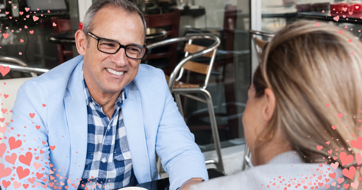 Blind Date Etiquette_ How To Prepare For Meeting Someone New Learning To Love And Be Loved - Mature Singles Finding Love Smiling middle-aged man on a blind date at an outdoor café.