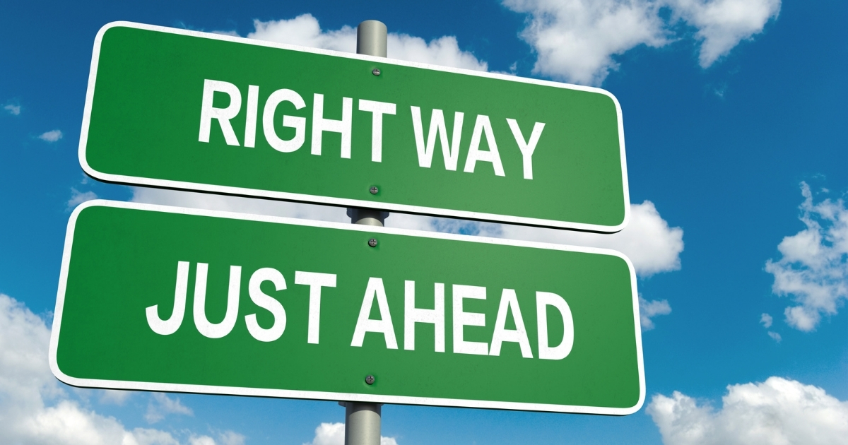 Dating Green Flags_ Signs You Are Dating The RIGHT Person - Mature Singles Finding Love Two green road signs against a blue sky with clouds, one reading 'RIGHT WAY' and the other reading 'JUST AHEAD,' symbolizing guidance and making the correct choices.