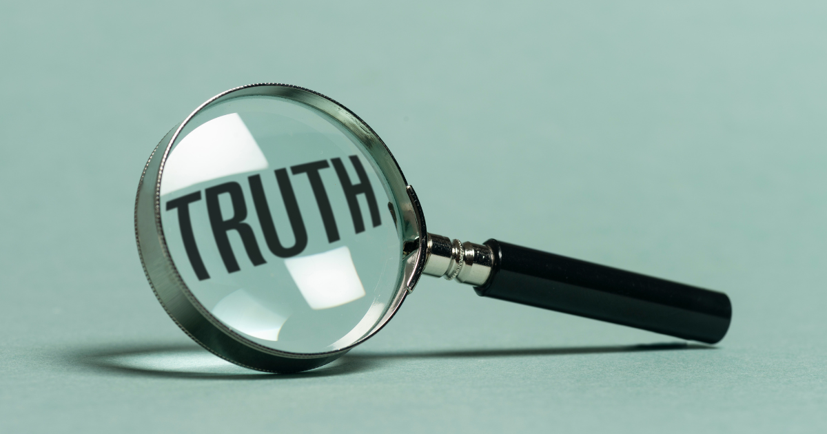 Honesty in Relationships Why It Matters More After 50 - Mature Singles Finding Love Magnifying glass with the word truth