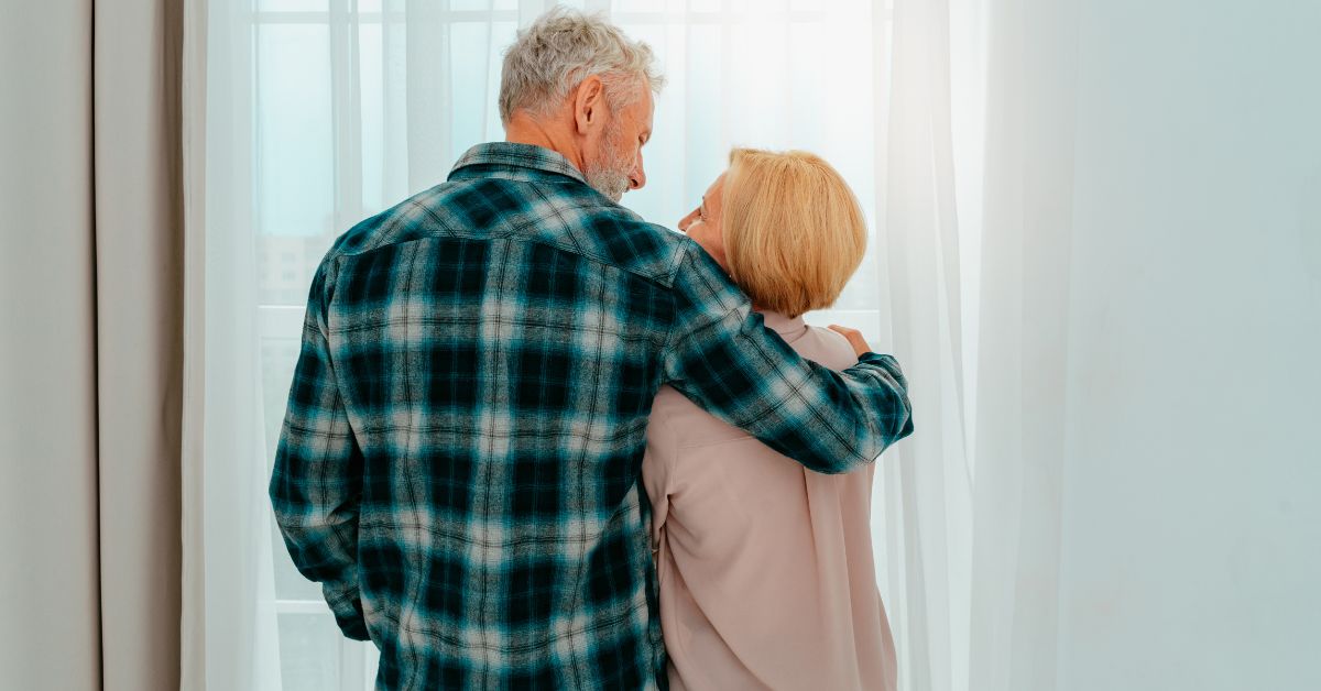 Older couple embracing and reconnecting emotionally – intimacy after 50