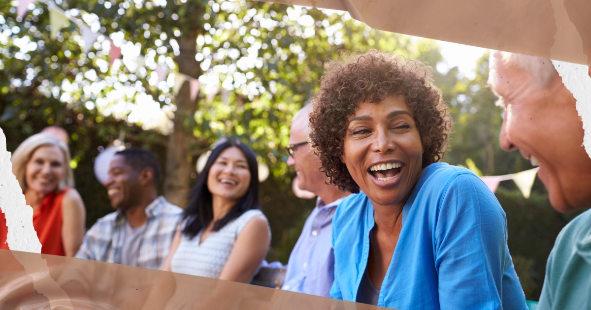 Happy older adults socializing outdoors, building friendships after 50