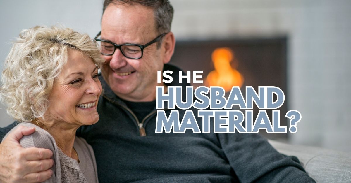 Is He Husband Material_ How To Know If He Is The One - Mature Singles Finding Love Smiling mature couple sitting together by a fireplace with text 'Is He Husband Material?' – relationship compatibility and marriage readiness.