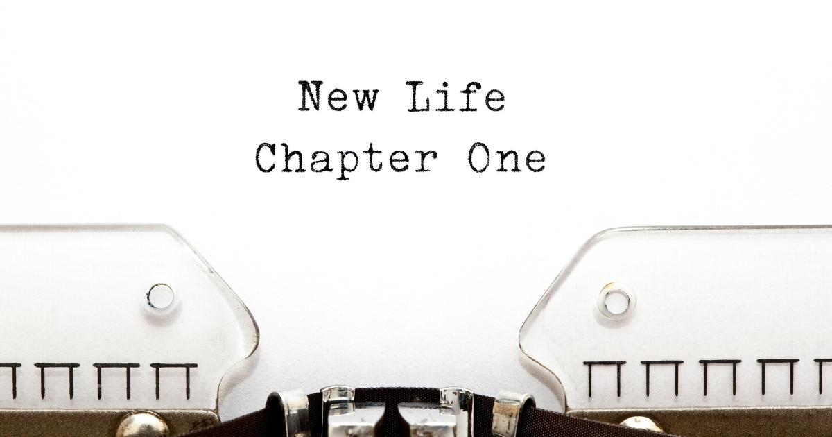 Typewriter typing 'New Life Chapter One' symbolizing a fresh start or new beginning.