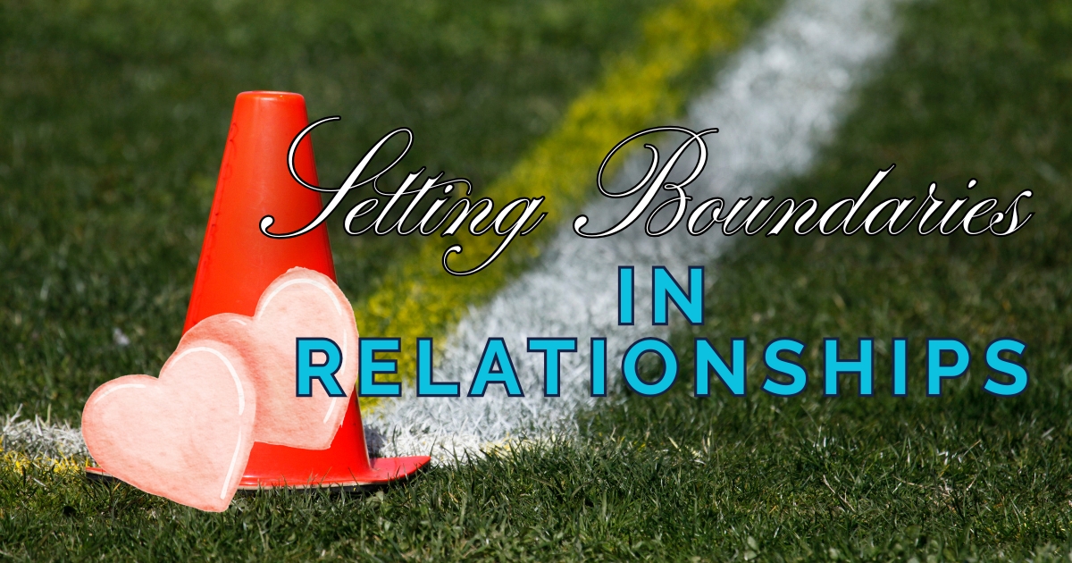 Orange traffic cone with two pink hearts on a sports field, symbolizing setting emotional boundaries in relationships with text overlay “Setting Boundaries in Relationships.”