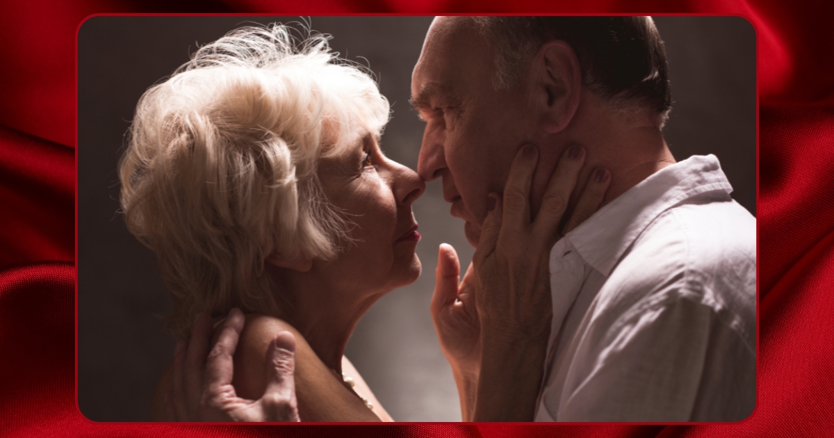 Romantic senior couple embracing and gazing into each other’s eyes, symbolizing love and intimacy in later life.