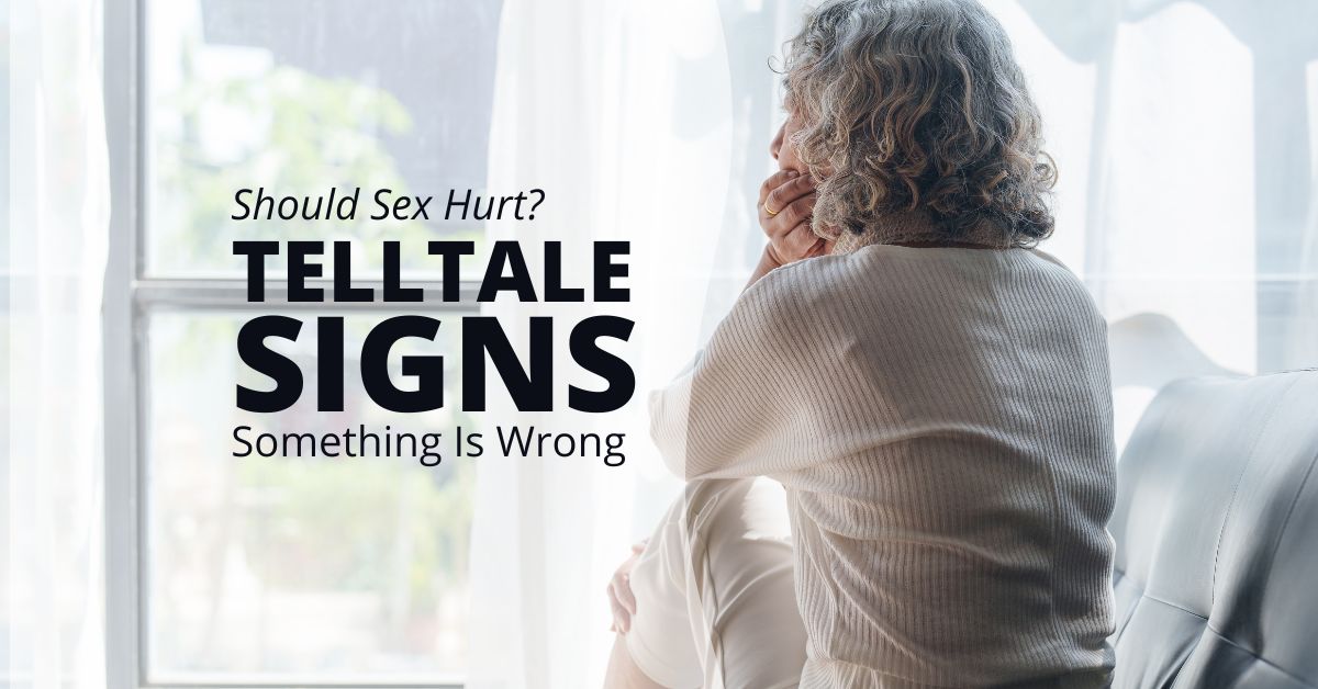 Should Sex Hurt_ The Telltale Signs Something Is Wrong - Mature Singles Finding Love Older woman sitting on a couch looking thoughtful and concerned, with text overlay saying ‘Should Sex Hurt? Telltale Signs Something Is Wrong’ against a softly lit window background.