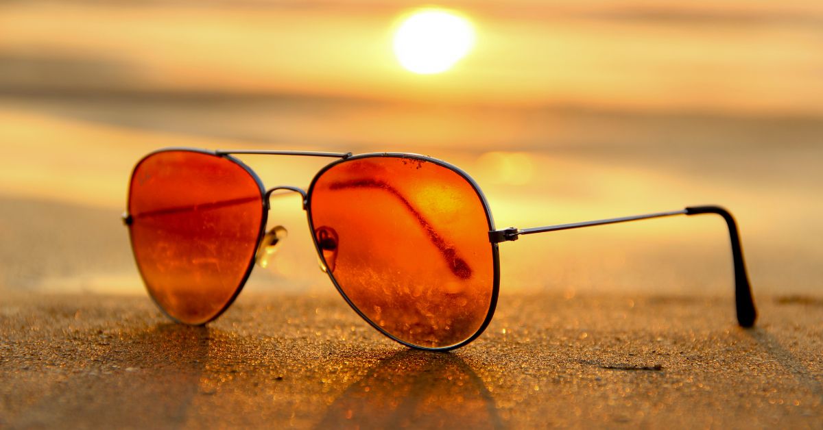 Single for the summer theme – sunset beach scene with trendy sunglasses