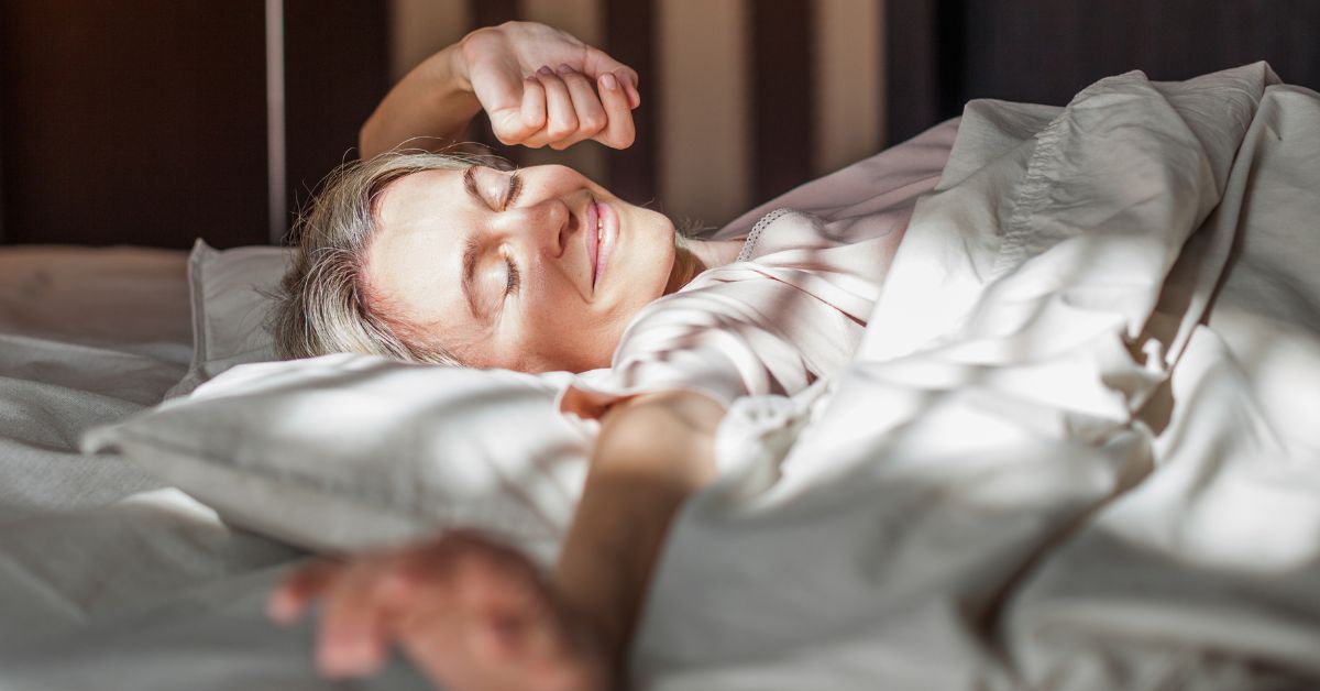 The Beauty of Falling in Love When You Know Yourself Better2 - Mature Singles Finding Love Happy mature woman waking up peacefully in bed with morning sunlight