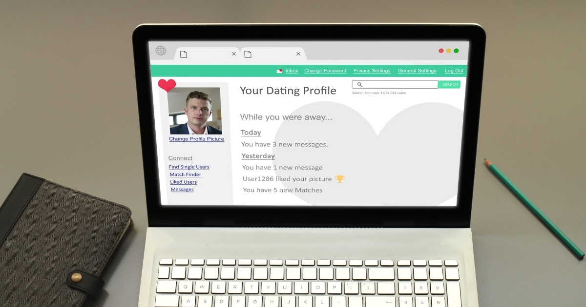 Why You Shouldnt Lie In Your Dating Profile - Mature Singles Finding Love A laptop screen displaying an online dating profile interface, showing new messages, matches, and a profile photo, with a notebook and pencil on the desk.